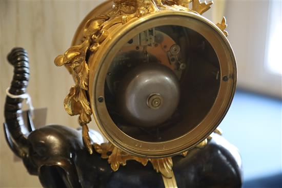 A late 19th century French bronze and ormolu mantel clock, height 17in.
